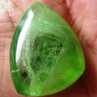 Olivine cabochon