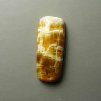 Karamelový silk opál s kočičím okem,kabošon č. 3 | sperkove- kameny.cz