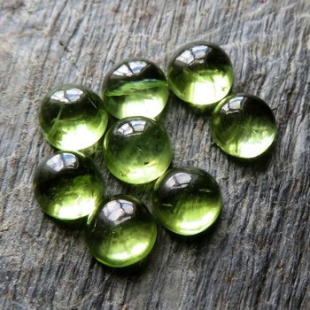 Olivine round cabochon 5 mm, type B; 1 piece