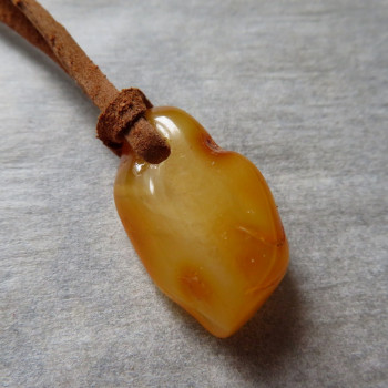 Honey natural Amber Lithuania, drilled with skin No. 5
