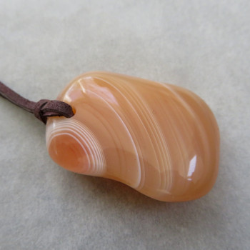 Carnelian Botswana, drilled stone with skin No.10
