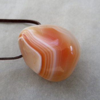 Carnelian Botswana, drilled stone with skin No.14