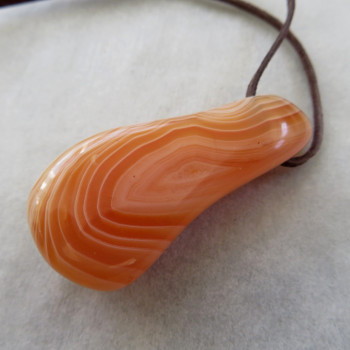 Carnelian Botswana, drilled stone with skin No.15
