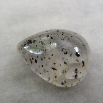 Crystal with biotite inclusions, cabochon no.6