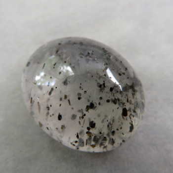 Crystal with biotite inclusions, cabochon no. 11