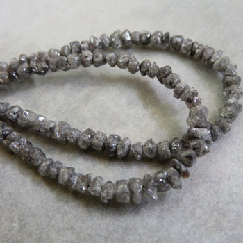 Dark silver diamond, approx. 4mm, 0.8mm hole (1 pc.)
