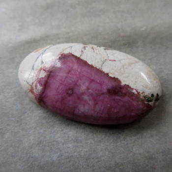 Cobaltocalcite in Congo rock, cabochon no.8