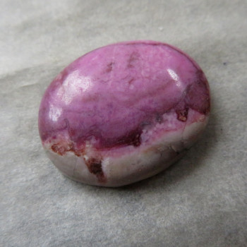Cobaltocalcite in Congo rock, cabochon no.9